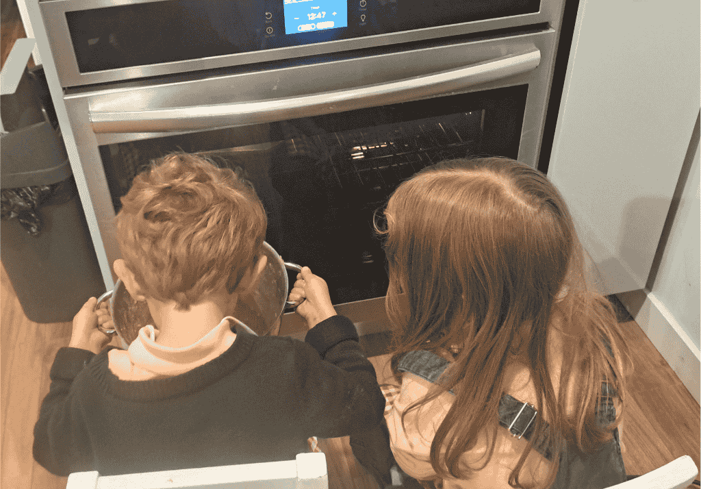 chef children watching the oven